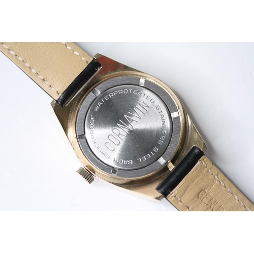 29 - *TO BE SOLD WITHOUT RESERVE* CORNAVIN DAY DATE GOLD PLATED WRIST WATCH, circular champagne dial with... 