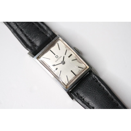 33 - LADIES OMEGA MANUAL WIND WRIST WATCH, rectangular silver dial with baton hour markers, 26mm stainles... 