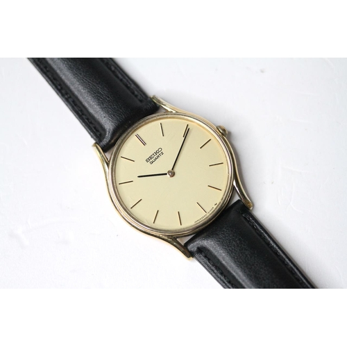 34 - *TO BE SOLD WITHOUT RESERVE* SEIKO QUARTZ GOLD PLATED WRIST WATCH, circular champagne dial with bato... 