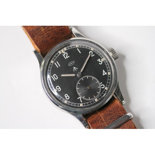 4 - IWC MILITARY WWW WRIST WATCH, circular black dial with arabic numeral hour markers, subsidiary secon... 