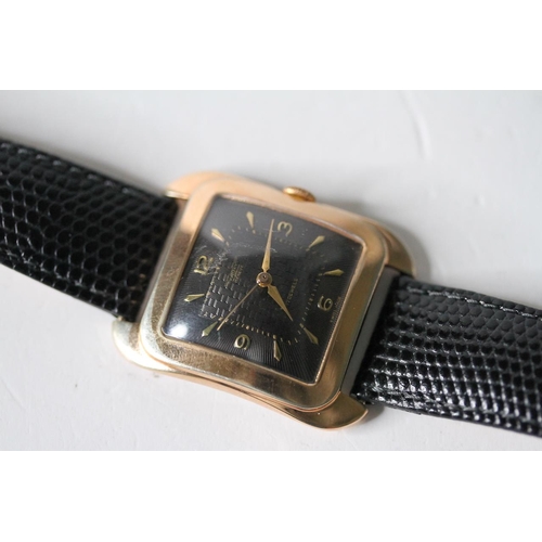 55 - OVERSIZED 1950S VALORY, domed cushion black dial with engine turned detail, gilt Arabic and dagger n... 