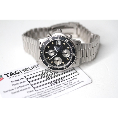 88 - TAG HEUER 2000 CHRONOGRAPH WITH SERVICE PAPERS, circular black dial with baton hour markers, date fu... 
