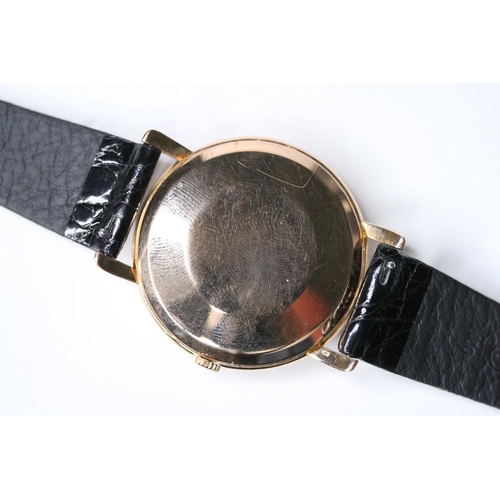 93 - VINTAGE 18CT IWC WRIST WATCH 1956, circular black dial with gold baton hour markers, 36mm 18ct gold ... 