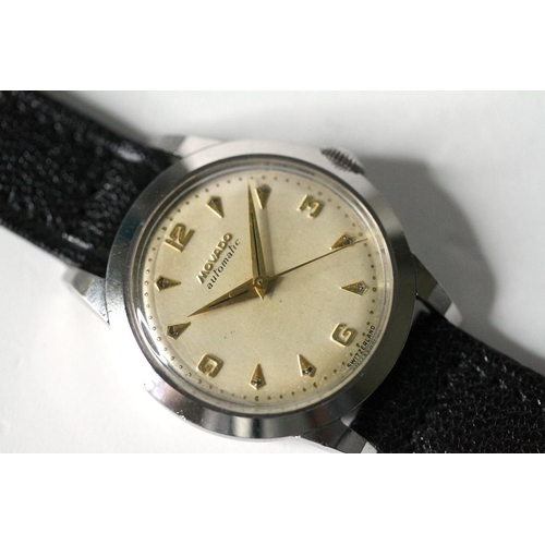 95 - MOVADO AUTOMATIC BUMPER MOVEMENT WRIST WATCH, circular cream dial with baton and arabic numersl hour... 