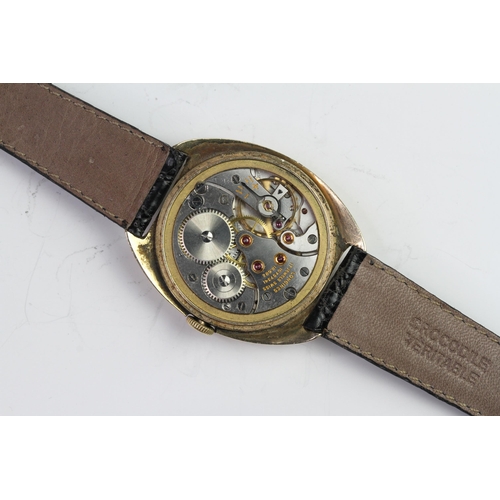 40 - 9CT LONGINES MANUAL WIND CIRCA 1958, circular cream patina dial with arabic and dagger hour markers,... 