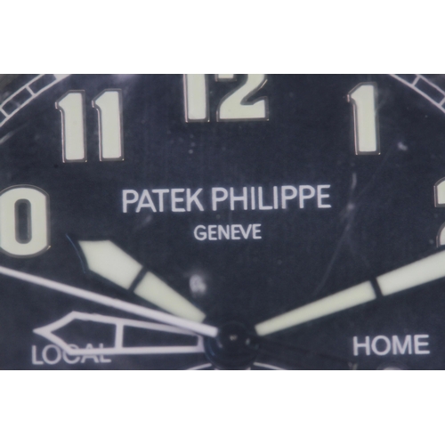55 - A FINE PATEK PHILIPPE CALATRAVA PILOT TRAVEL TIME REFERENCE 5224G-001, SEALED FROM SERVICE, WITH BOX... 