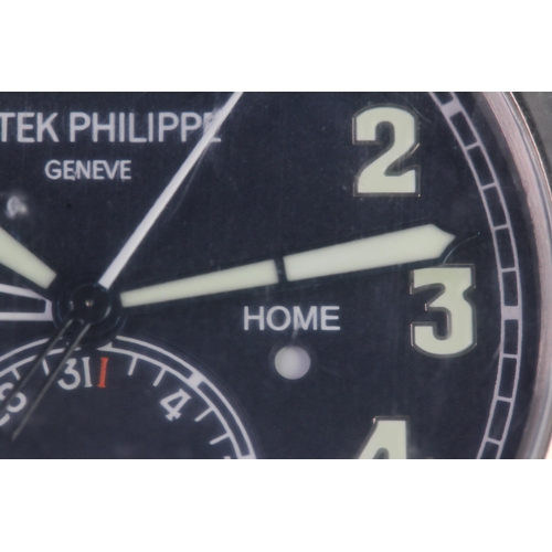 55 - A FINE PATEK PHILIPPE CALATRAVA PILOT TRAVEL TIME REFERENCE 5224G-001, SEALED FROM SERVICE, WITH BOX... 