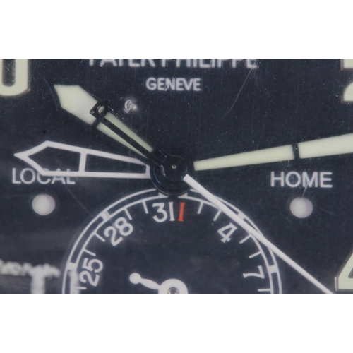 55 - A FINE PATEK PHILIPPE CALATRAVA PILOT TRAVEL TIME REFERENCE 5224G-001, SEALED FROM SERVICE, WITH BOX... 