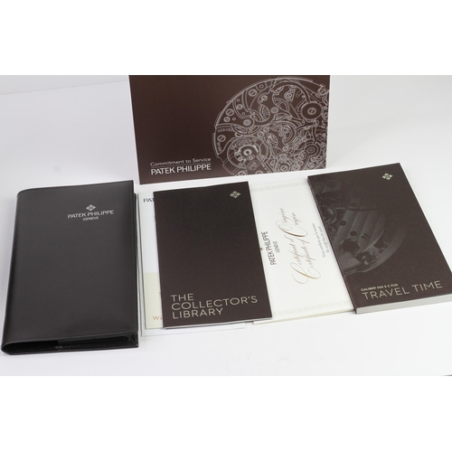 55 - A FINE PATEK PHILIPPE CALATRAVA PILOT TRAVEL TIME REFERENCE 5224G-001, SEALED FROM SERVICE, WITH BOX... 
