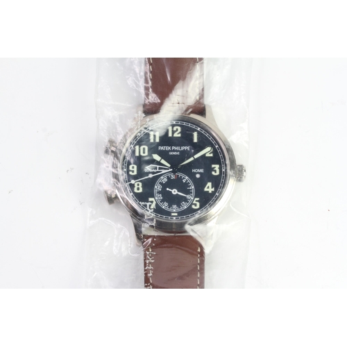 55 - A FINE PATEK PHILIPPE CALATRAVA PILOT TRAVEL TIME REFERENCE 5224G-001, SEALED FROM SERVICE, WITH BOX... 