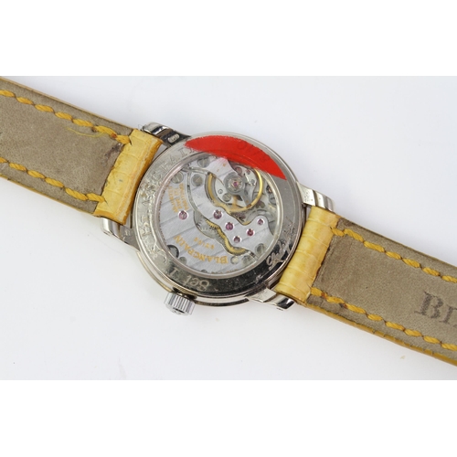 104 - 18 CT BLANCPAIN LADYBIRD WRISTWATCH, Mother of Pearl dial with roman numer hour markers. in a 18 ct ... 