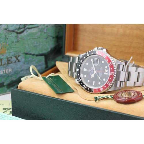 12 - ROLEX GMT MASTER II 'COKE' REFERENCE 16710 WITH BOX CIRCA 2003, circular gloss black dial with appli... 