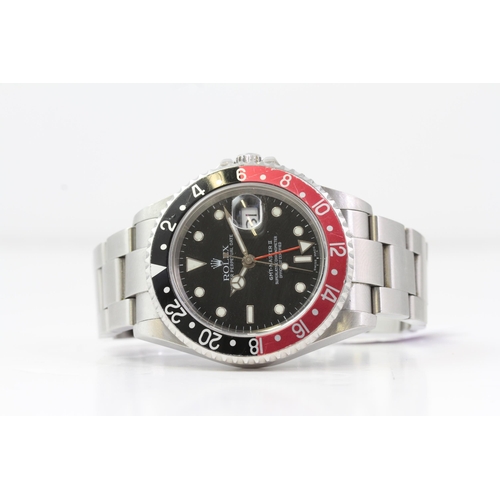 12 - ROLEX GMT MASTER II 'COKE' REFERENCE 16710 WITH BOX CIRCA 2003, circular gloss black dial with appli... 