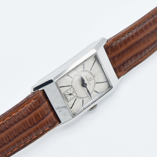 200 - OMEGA DECO STYLE TANK WRISTWATCH CALIBER 20F IN STAINLESS STEEL CASE CIRCA 1934 WITH SUNRISE DIAL. S... 