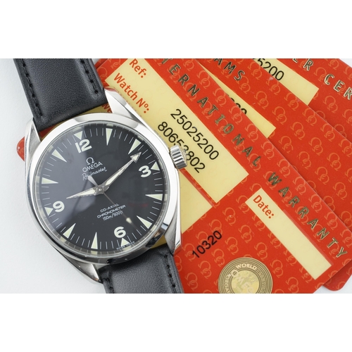 232 - OMEGA RAILMASTER CO-AXIAL CHRONOMETER WRISTWATCH W/ GUARANTEE CARDS REF. 25025200, circular black di... 