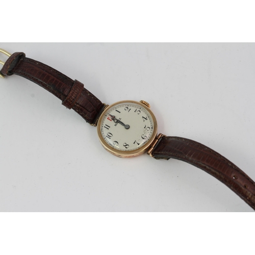 301 - ROSE GOLD LADIES ROLEX CIRCA 1920/30s, white dial with Arabic numeral hour markers with red 12, in a... 