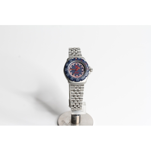 317 - VINTAGE LADIES TAG HEUER PROFESSIONAL 200, blue dial with white track, blue outer bezel, stainless s... 