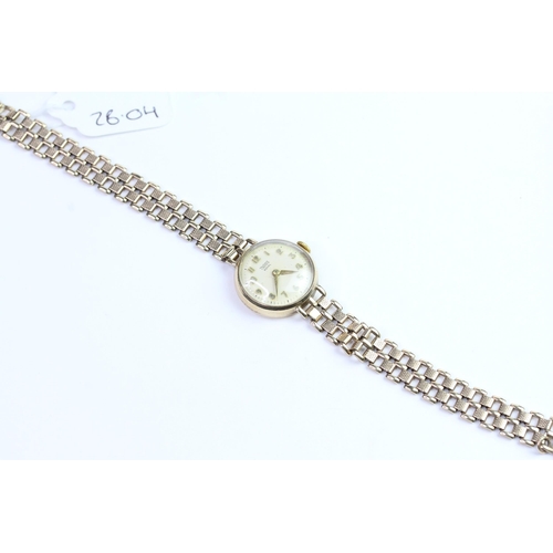 322 - 9CT LADIES TUDOR WRISTWATCH, Cream dial wit Arabic numeral hour markers in a 9ct case with Rolex cro... 