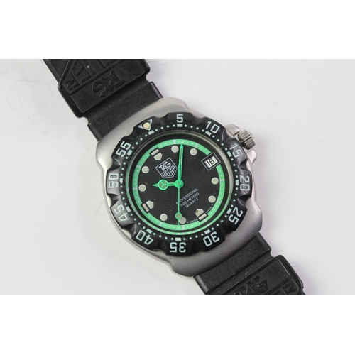 327 - VINTAGE TAG HEUER FORMULA 1 PROFESSIONAL 200M  'GHOSTBUSTER' REFERENCE WA1215,  black dial with lime... 