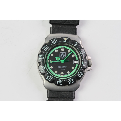 327 - VINTAGE TAG HEUER FORMULA 1 PROFESSIONAL 200M  'GHOSTBUSTER' REFERENCE WA1215,  black dial with lime... 