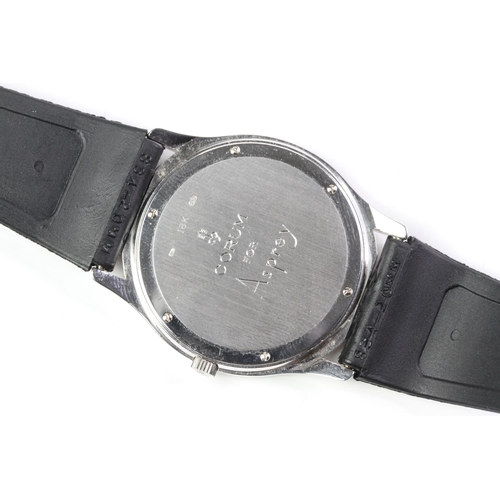 374 - 18CT CORUM FOR ASPREY DIAMOND BEZEL WRIST WATCH, black circular dial with two galloping horses, diam... 