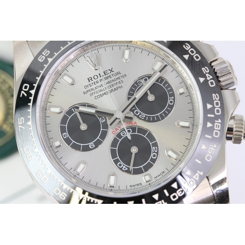 40 - 18CT ROLEX DAYTONA WHITE GOLD 116519LN WITH BOX AND PAPERS 2022, circular sunburst silver dial with ... 