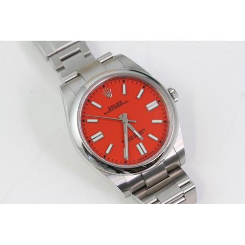 42 - ROLEX OYSTER PERPETUAL 41 CORAL RED REFERENCE 124300 BOX AND PAPERS 2022, circular coral red dial wi... 