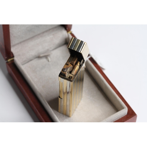 462 - Solid 18ct Dunhill two tone Rollagas, white and yellow gold, singed and import mark to base, boxed, ... 