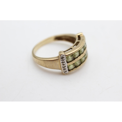 611 - 9ct gold peridot & diamond double row channel setting ring (3.5g)