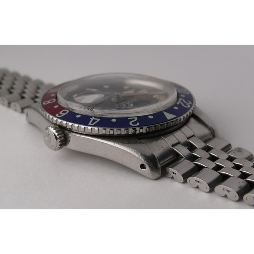 99 - VINTAGE ROLEX GMT MASTER 'PEPSI' REFERENCE 6542 WITH PAPERS 1959, circular gloss black dial with pat... 