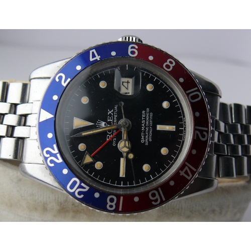 99 - VINTAGE ROLEX GMT MASTER 'PEPSI' REFERENCE 6542 WITH PAPERS 1959, circular gloss black dial with pat... 