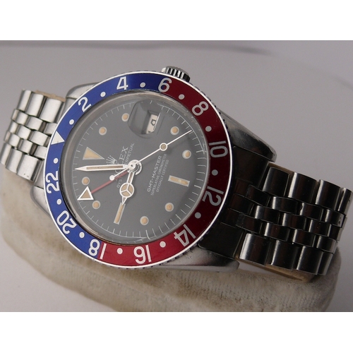 99 - VINTAGE ROLEX GMT MASTER 'PEPSI' REFERENCE 6542 WITH PAPERS 1959, circular gloss black dial with pat... 