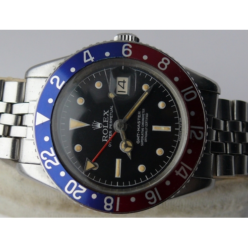 99 - VINTAGE ROLEX GMT MASTER 'PEPSI' REFERENCE 6542 WITH PAPERS 1959, circular gloss black dial with pat... 