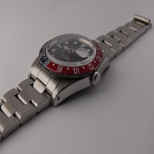 121 - VINTAGE ROLEX GMT MASTER 'PEPSI' REFERENCE 6542 CIRCA 1958, circular black professionally restored d... 