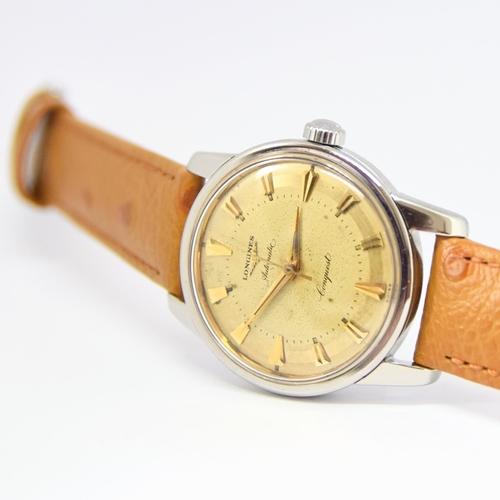 173 - LONGINES CONQUEST WITH TWO TONE DIAL MODEL 9000 IN STAINLESS STEEL CAL. 19AS AUTOMATIC DATED 1957. S... 