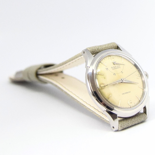 174 - BAUME SWISS POWER RESERVE AUTOMATIC WRISTWATCH WITH ARABIC NUMERALS CIRCA 1950s. AUTOMATIC CAL, stai... 