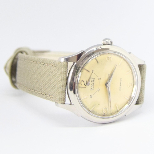 174 - BAUME SWISS POWER RESERVE AUTOMATIC WRISTWATCH WITH ARABIC NUMERALS CIRCA 1950s. AUTOMATIC CAL, stai... 