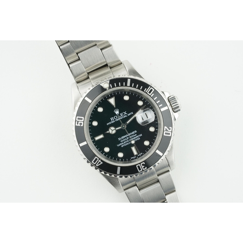 181 - ROLEX OYSTER PERPETUAL DATE SUBMARINER W/ BOX & GUARANTEE PAPERS REF. 16610 CIRCA 2002, circular bla... 