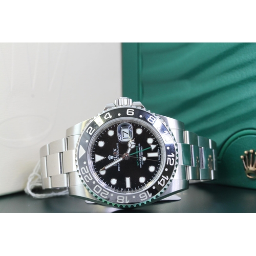 30 - ROLEX GMT MASTER II BOX AND PAPERS 2016 REFERENCE 116710LN, circular gloss black dial with applied h... 