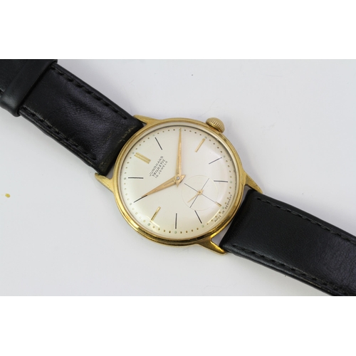 122 - MANUAL WIND JUNGHANS TRAILASTIC 34MM, Circular cream dial with baton hour markers and a sconds sub d... 