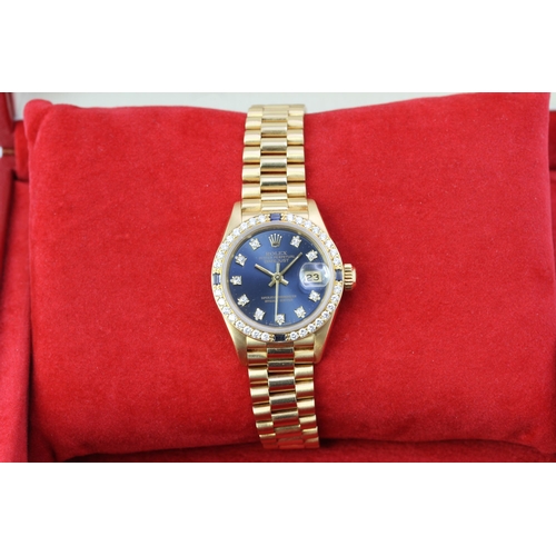 26 - 18CT LADIES ROLEX DATEJUST SAPPHIRE AND DIAMOND SET REFERENCE 69088 WITH BOX, circular sunburst blue... 