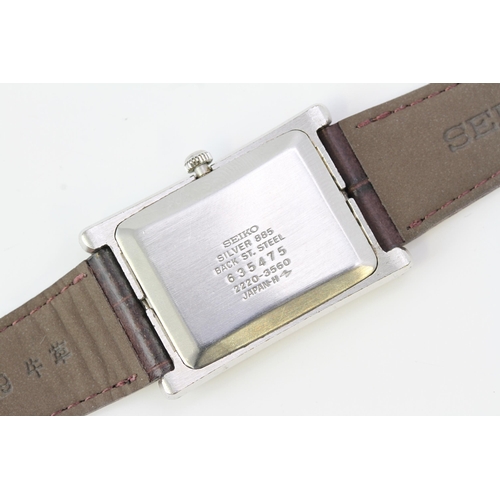 63 - SEIKO 885 SILVER MANUAL WIND WRISTWATCH, rectangular black dial, 885 silver case, brown Seiko leathe... 