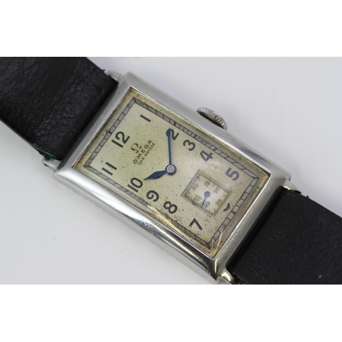 67 - OMEGA ART DECO T17 MANUAL WIND WRISTWATCH, rectangular patina dial with arabic numeral hour markers,... 