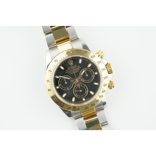 97 - ROLEX OYSTER PERPETUAL COSMOGRAPH DAYTONA STEEL & GOLD REF. 116523 CIRCA 2005, circular black triple... 