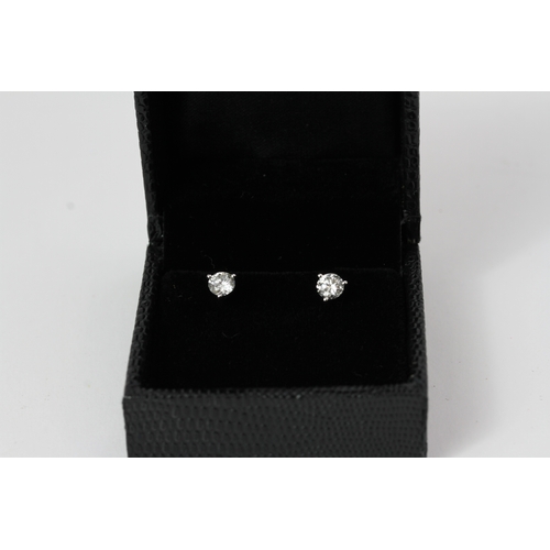 1150 - 18ct Gold Diamond Stud Earrings. Approximately 1ct of diamonds set in white 18ct gold, stud and butt... 