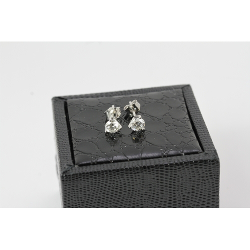 1150 - 18ct Gold Diamond Stud Earrings. Approximately 1ct of diamonds set in white 18ct gold, stud and butt... 