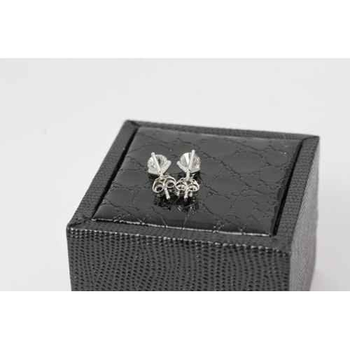 1150 - 18ct Gold Diamond Stud Earrings. Approximately 1ct of diamonds set in white 18ct gold, stud and butt... 