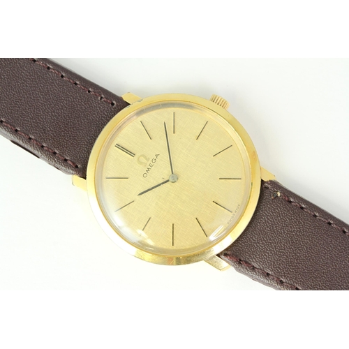 107 - MANUAL WIND OMEGA, Champagne dial, in a 33mm gold plated case. On a leather strap with buckle. Curre... 