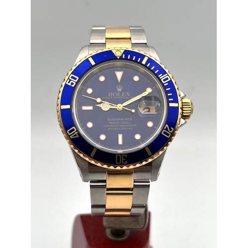 15 - ROLEX BI-COLOUR SUBMARINER 16613 BOX AND PAPERS 1994, Blue dial with applied baton and dot hour mark... 