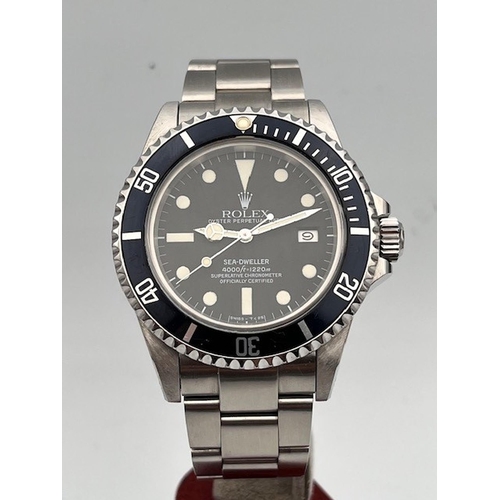 16 - ROLEX SEA-DWELLER 16660 BOX AND PAPERS 1983, Black dial with applied baton and dot hour markers, wit... 